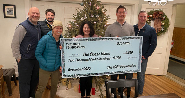 Left to right - The 1623 Foundation's Andrew Guyton, James Tobin and Carson Duggan with Chase Home Executive Director Meme Wheeler and The 1623 Foundation's Rich Stover and Tyler Kelly.
